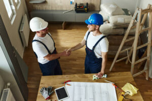 General contracting services in Santa Clarita – Shadai Construction partnership agreement at a construction site.