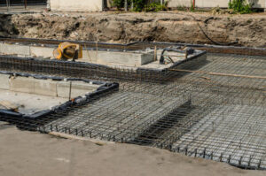 concrete machine  stands atop a concrete foundation, showcasing the strength and durability of the base supporting the structure.