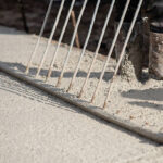 A concrete mixer working to combine materials for a concrete driveway contractors project by .